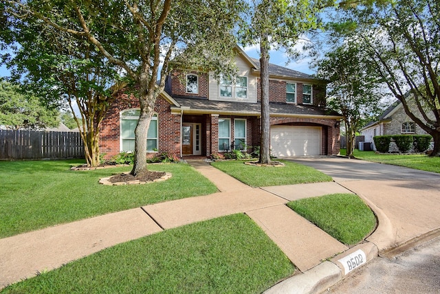8502 Calverton Pines Ln, Houston, TX 77095 - view of front of home with brick siding, asphalt driveway, central air condition unit, and a garage