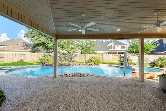 8502 Calverton Pines Ln, Houston, TX 77095 - view of swimming pool with a ceiling fan, a patio, and a fenced backyard