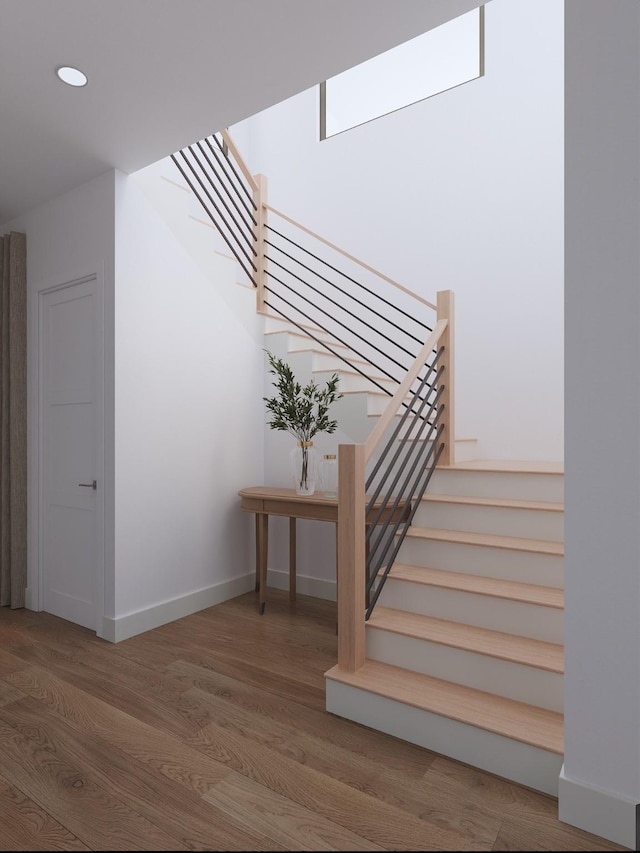 1039 Alexander St, Houston, TX 77008 - stairs with wood finished floors, recessed lighting, and baseboards