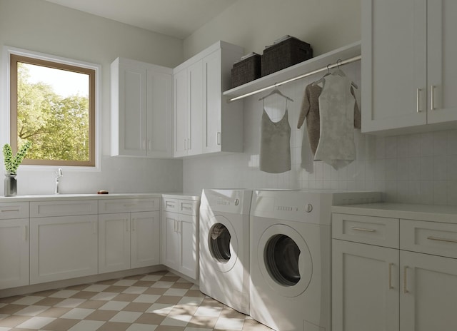 1039 Alexander St, Houston, TX 77008 - laundry room featuring cabinet space, washing machine and dryer, and light flooring