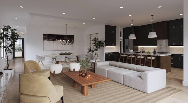 1039 Alexander St, Houston, TX 77008 - living room with light wood-type flooring, a chandelier, and recessed lighting
