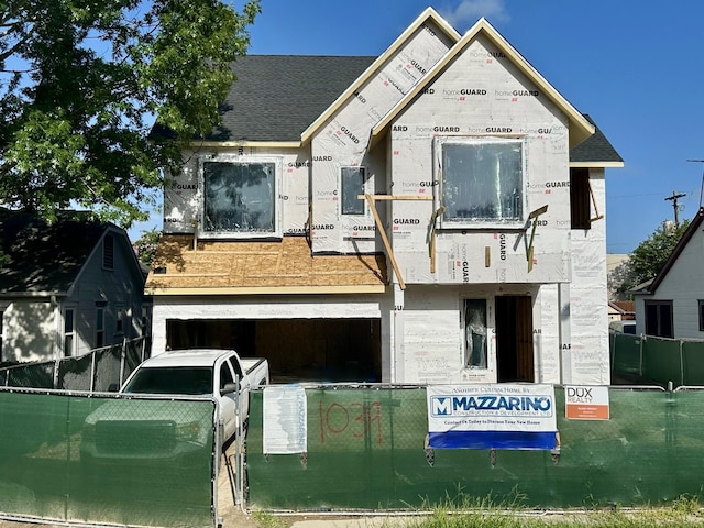 1039 Alexander St, Houston, TX 77008 - view of front of home featuring an attached garage and a shingled roof