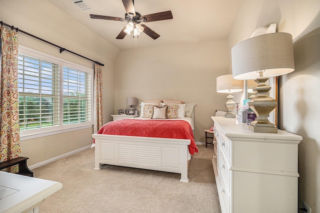 bedroom featuring light carpet, baseboards, and ceiling fan