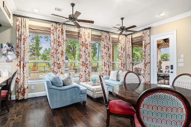 sunroom / solarium with crown molding, hardwood / wood-style floors, baseboards, and recessed lighting