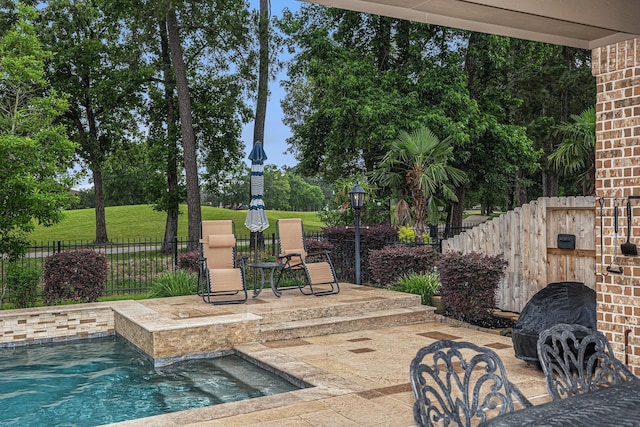 view of patio featuring fence