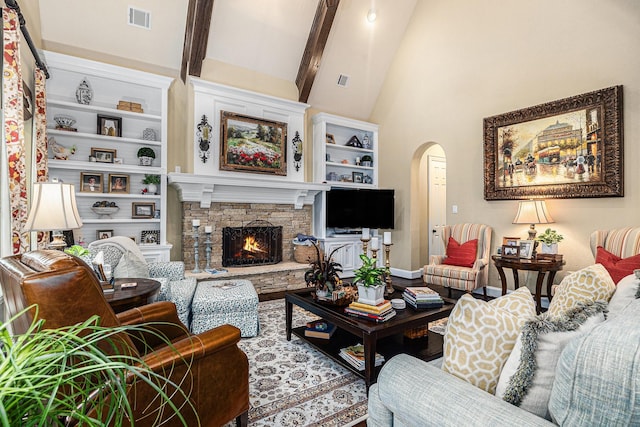 living room with arched walkways, a fireplace, high vaulted ceiling, beam ceiling, and wood finished floors