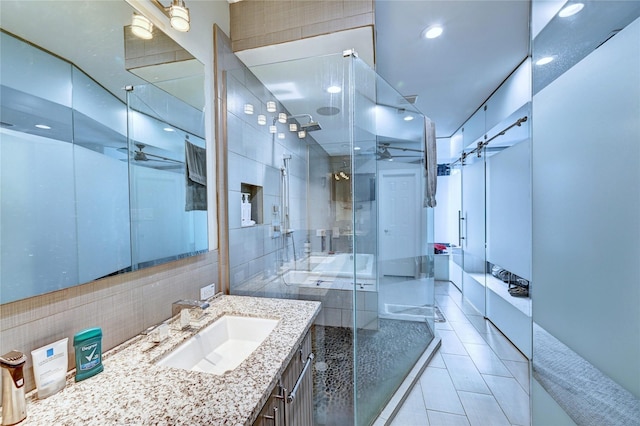 5507 Darling St, Houston, TX 77007 - full bath with a ceiling fan, a shower stall, tile patterned flooring, vanity, and recessed lighting