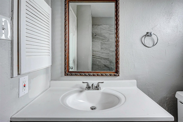 4969 E Rdg Creek Dr, Houston, TX 77053 - bathroom featuring toilet and vanity