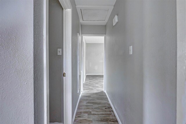 4969 E Rdg Creek Dr, Houston, TX 77053 - hallway with baseboards and wood finished floors