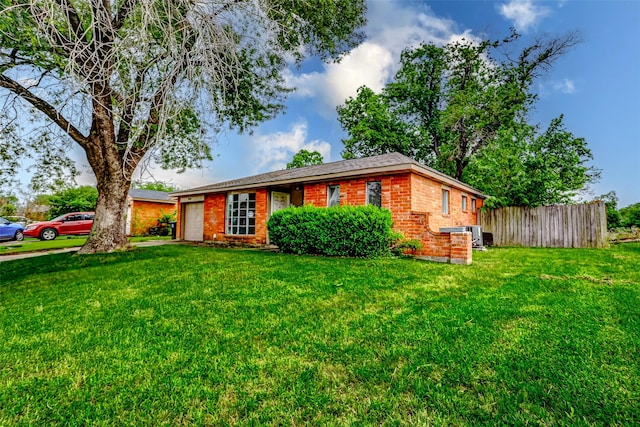 single story home with an attached garage and brick siding