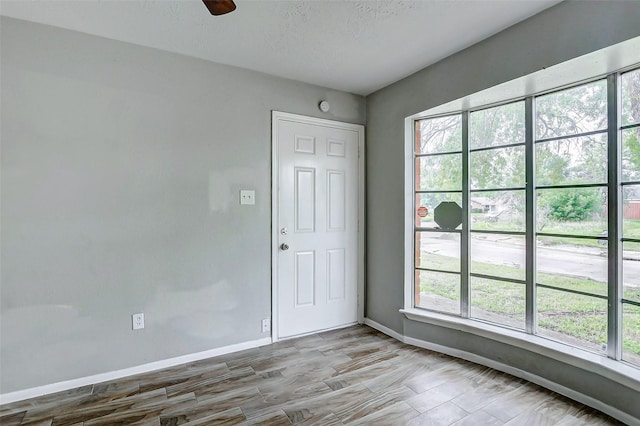 4969 E Rdg Creek Dr, Houston, TX 77053 - empty room with baseboards and wood finished floors