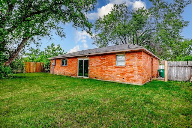 4969 E Rdg Creek Dr, Houston, TX 77053 - rear view of property featuring brick siding