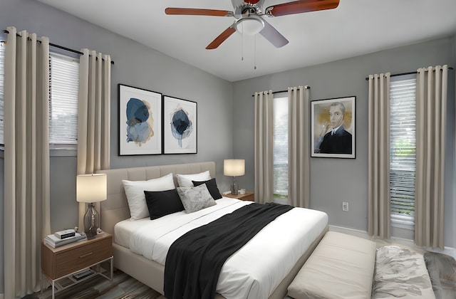 4969 E Rdg Creek Dr, Houston, TX 77053 - bedroom featuring ceiling fan and baseboards