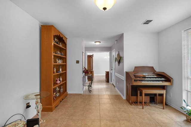 24930 Plantation Estates Ave, Porter, TX 77365 - hallway with light tile patterned floors and baseboards