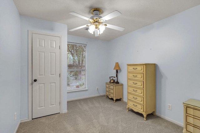 24930 Plantation Estates Ave, Porter, TX 77365 - bedroom with light carpet, baseboards, and ceiling fan