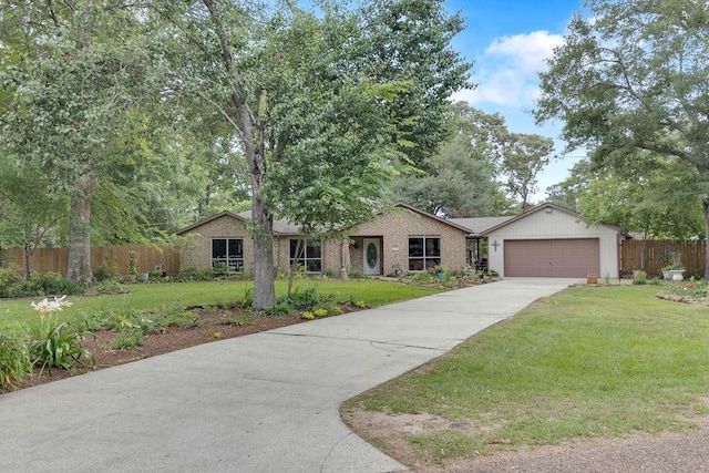 24930 Plantation Estates Ave, Porter, TX 77365 - ranch-style house featuring driveway and an attached garage