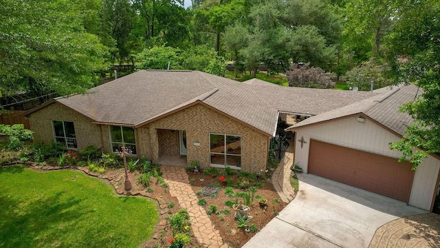 24930 Plantation Estates Ave, Porter, TX 77365 - ranch-style house with driveway, roof with shingles, a front lawn, and a garage