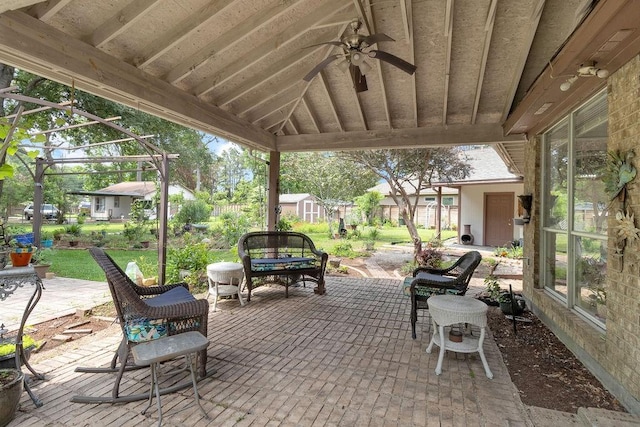 24930 Plantation Estates Ave, Porter, TX 77365 - view of patio with ceiling fan, a storage shed, an outbuilding, and a residential view