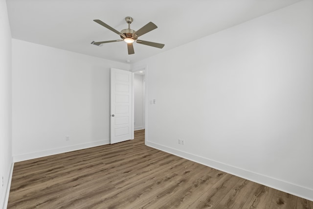 5615 Savyon Dr, Houston, TX 77091 - spare room featuring wood finished floors, baseboards, and ceiling fan