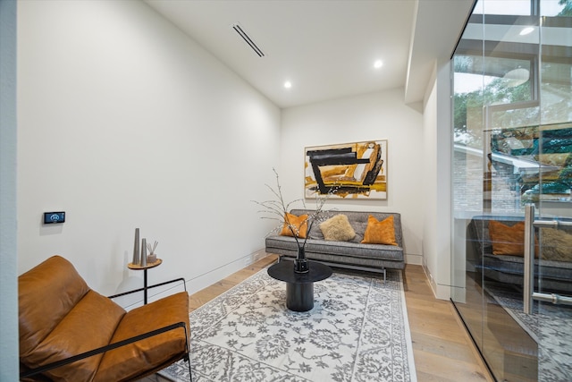 5686 Bayou Glen Rd, Houston, TX 77056 - living area with wood finished floors, recessed lighting, and baseboards