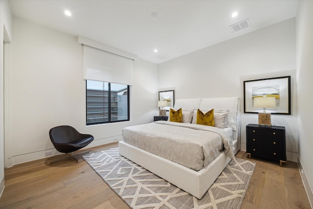 5686 Bayou Glen Rd, Houston, TX 77056 - bedroom with wood finished floors, recessed lighting, and baseboards