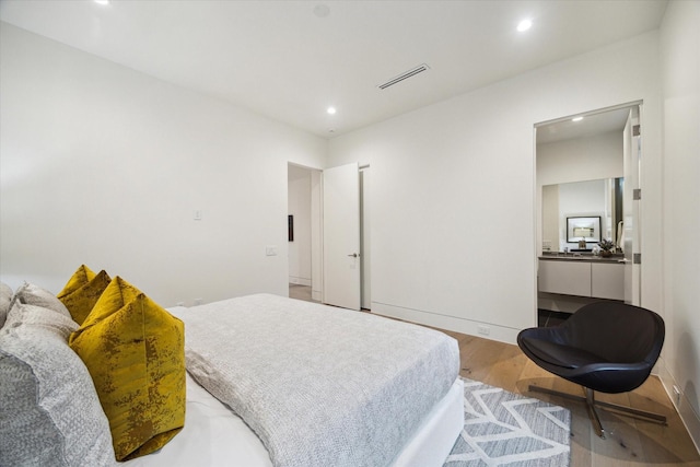 5686 Bayou Glen Rd, Houston, TX 77056 - bedroom with recessed lighting and wood finished floors
