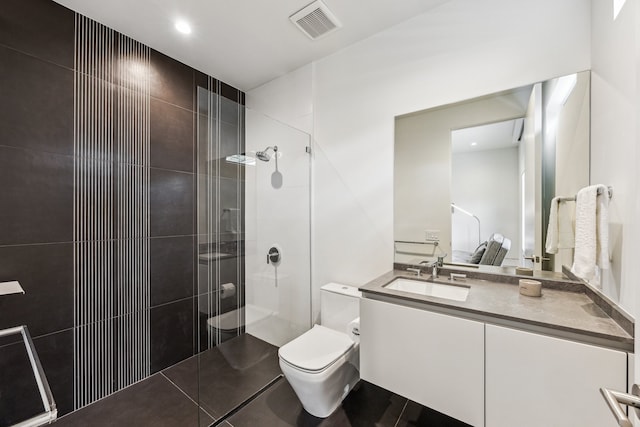 5686 Bayou Glen Rd, Houston, TX 77056 - full bathroom featuring toilet, a tile shower, and vanity