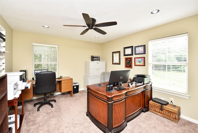 office space with light carpet, ceiling fan, recessed lighting, and baseboards