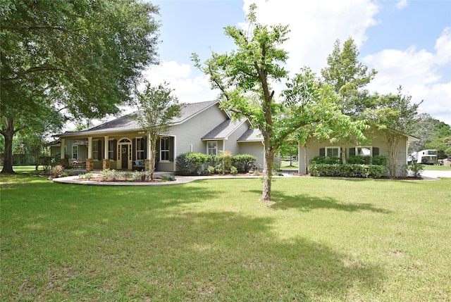 view of front of property with a front lawn