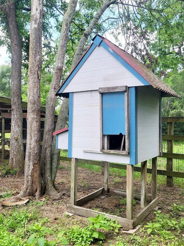 view of poultry coop with fence