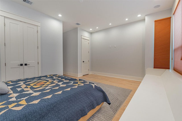 406 Fenn St Unit A, Houston, TX 77018 - bedroom featuring light wood-style flooring, recessed lighting, and baseboards