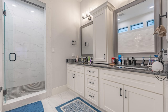 406 Fenn St Unit A, Houston, TX 77018 - full bathroom featuring marble look tiles, a marble finish shower, double vanity, and baseboards