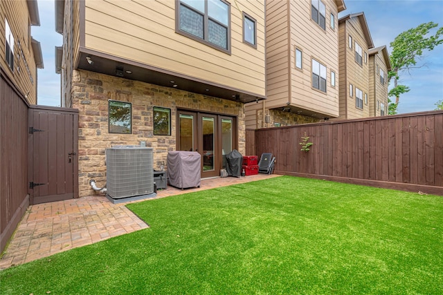 406 Fenn St Unit A, Houston, TX 77018 - view of yard featuring central air condition unit, a patio, and french doors