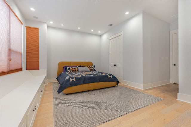 406 Fenn St Unit A, Houston, TX 77018 - bedroom with light wood finished floors, recessed lighting, and baseboards