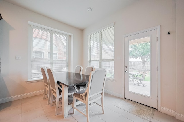 1618 Quail Ridge Dr, Katy, TX 77493 - dining room with plenty of natural light, baseboards, and light tile patterned flooring