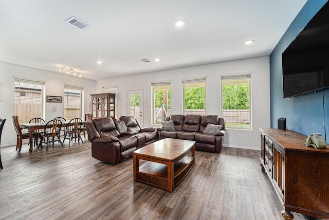 4319 Liberty Ranch Way, Baytown, TX 77521 - living area with wood finished floors, healthy amount of natural light, baseboards, and recessed lighting