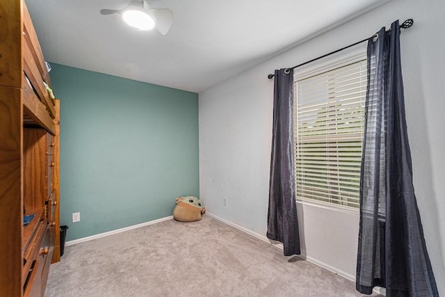 4319 Liberty Ranch Way, Baytown, TX 77521 - unfurnished bedroom featuring carpet flooring, baseboards, and a ceiling fan