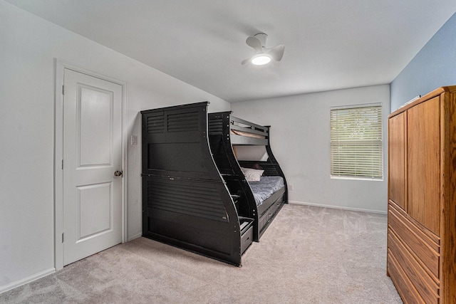 4319 Liberty Ranch Way, Baytown, TX 77521 - unfurnished bedroom featuring light carpet, baseboards, and ceiling fan