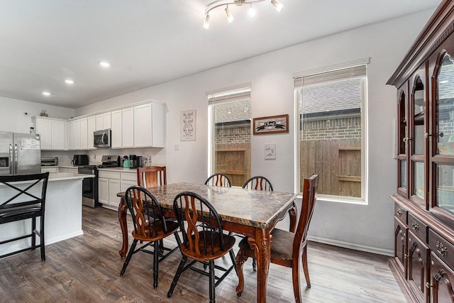4319 Liberty Ranch Way, Baytown, TX 77521 - dining room with dark wood finished floors, recessed lighting, and baseboards