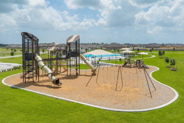 4319 Liberty Ranch Way, Baytown, TX 77521 - community jungle gym featuring a yard and a residential view