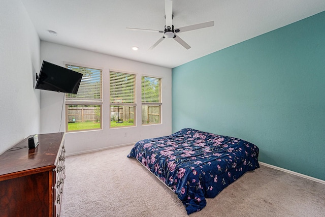 4319 Liberty Ranch Way, Baytown, TX 77521 - carpeted bedroom featuring baseboards and a ceiling fan