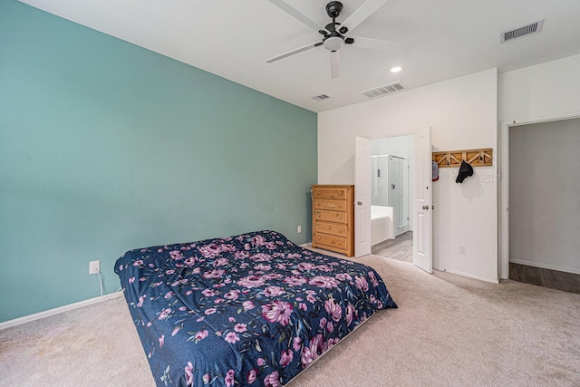 4319 Liberty Ranch Way, Baytown, TX 77521 - carpeted bedroom featuring baseboards, connected bathroom, recessed lighting, ceiling fan, and a spacious closet