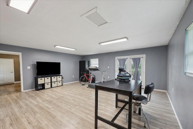 985 Sunnyside Dr, Bridge City, TX 77611 - office space featuring light wood-type flooring, attic access, and baseboards