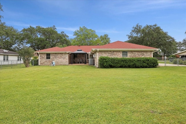 985 Sunnyside Dr, Bridge City, TX 77611 - back of house featuring brick siding