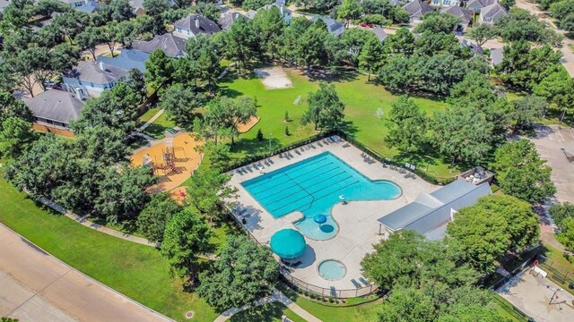 drone / aerial view of a pool area