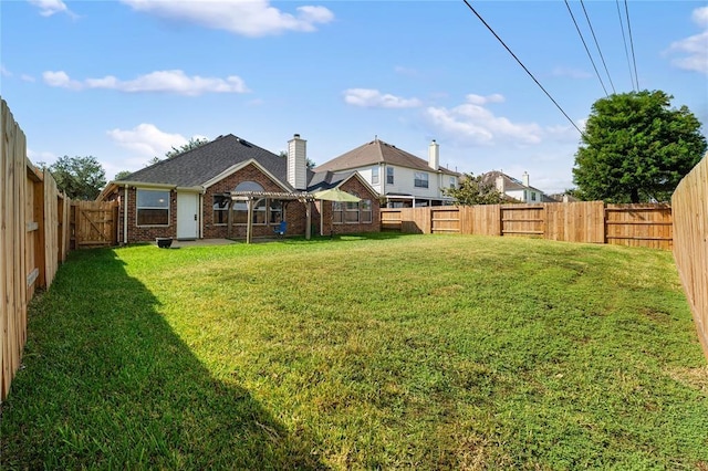 view of yard featuring a patio