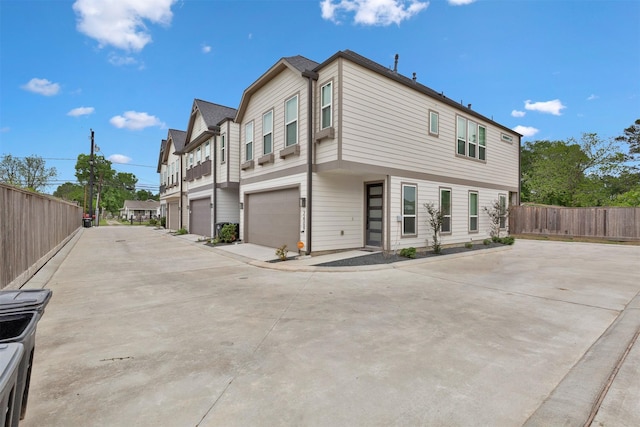 2609 Paul Quinn St, Houston, TX 77091 - view of home's exterior with an attached garage and driveway