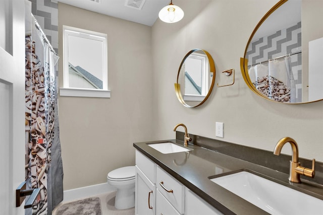 2609 Paul Quinn St, Houston, TX 77091 - full bathroom featuring double vanity, curtained shower, and tile patterned flooring