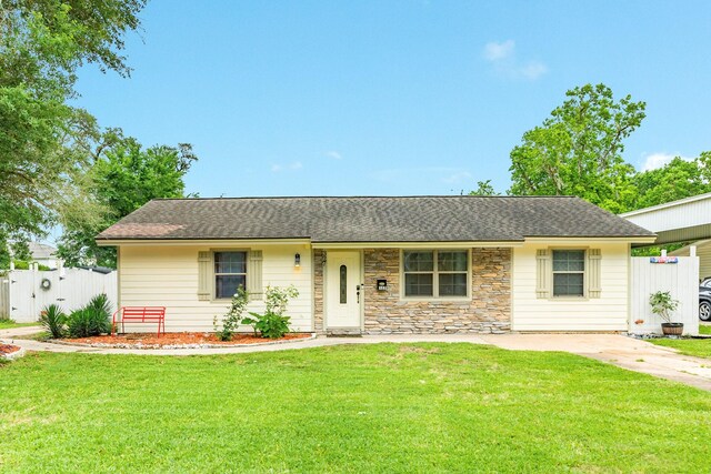 single story home with a shingled roof and stone siding