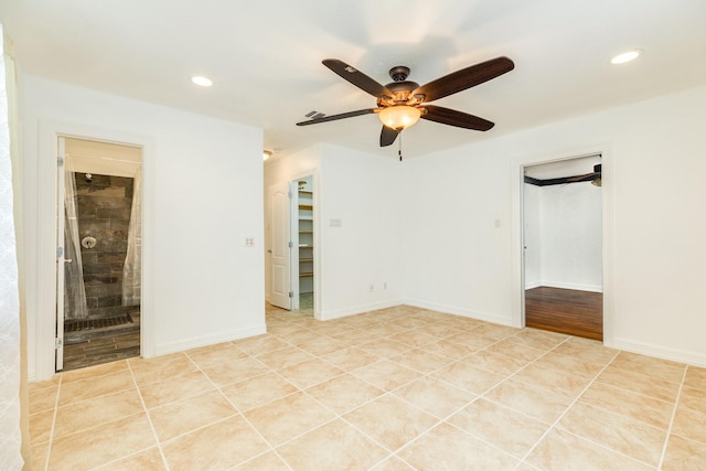 spare room featuring ceiling fan, recessed lighting, and light tile patterned flooring